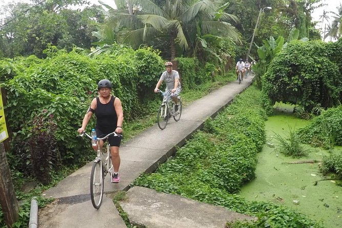 Half-Day Bangkok Bike Tour Including Lunch - Stop 5 and the Weekend Twist: Taling Chan Floating Market