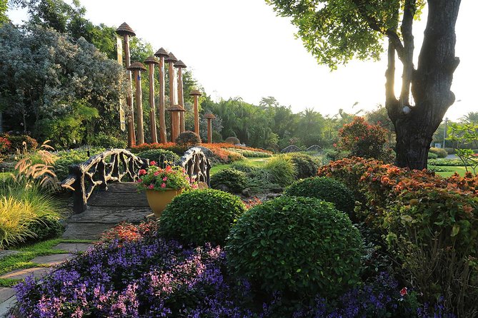 Half Day Phra That Doi Kham Temple and Royal Park Rajapruek (Private Tour) - Royal Park Rajapruek: plants from around the world in a garden that wants more time