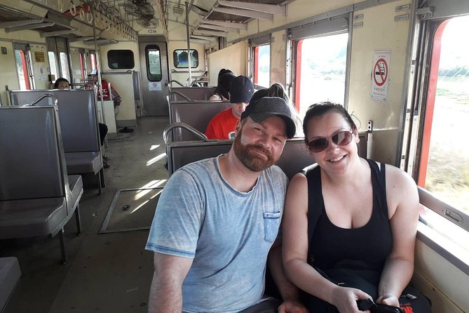 Half-Day Railway Market and Floating Market Tour in Thailand - Guides, Language Options, and What Good Ones Do