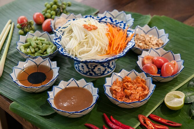 Hands-on Thai Cooking Class & Market Tour in Sukhumvit - Inside the kitchen: coconut milk, curry paste, and real technique