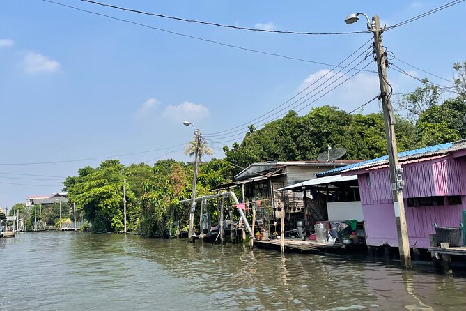 Hidden Bangkok Longtail Boat Tour to Big Buddha&Canal Life 2hrs - Big Buddha From the Water: Wat Paknam’s Iconic Pass-By