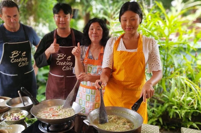 Home Style Family class with fruit carving and market tour - The Market Tour: Herbs, Ingredients, and Local Habits