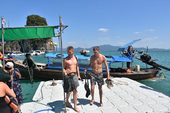 Hong Islands Longtail Boat Tour with Kayak Paddling - Hong Island time on land: beaches, lizards, and that viewpoint climb