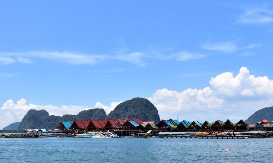 James Bond Island: Sightseeing Tour by Longtail Boat & Kayak - Longtail boat cruising in Phang Nga Bay: the best “slow down” segment