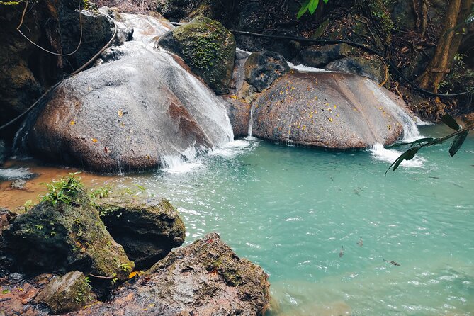 Kanchanaburi Tour: Erawan Waterfall and Death Railway - Erawan Waterfalls: swim in the emerald pools, see the 7 tiers