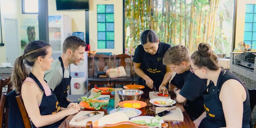 Khao Lak Pui's Authentic Thai Cooking Class - Prep time in a spotless kitchen with quality tools