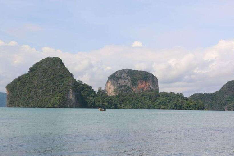 Khaolak: Phang Nga Bay, Tapu Island, and Panyi Village Tour - Long-tail boat into Phang Nga Bay: what makes it feel special
