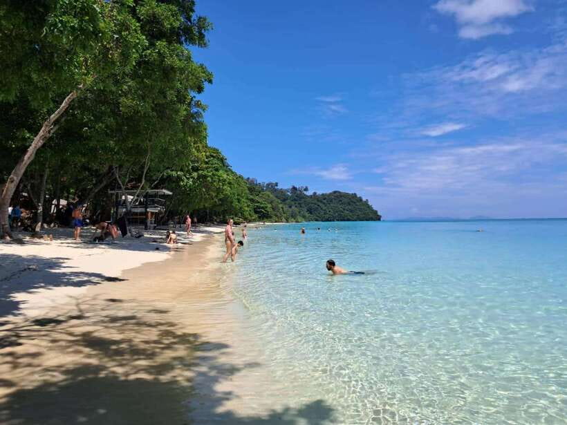 Koh Lanta: Koh Rok and Koh Haa Snorkeling Adventure - Koh Rok snorkeling: coral reefs, sea anemones, and making the most of two swims