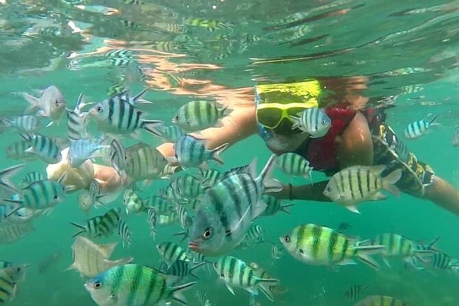 Koh Phangan Snorkelling Cruise with Sunset - Second Stop: Koh Raham Snorkeling and a Beach That Feels Like Another Time