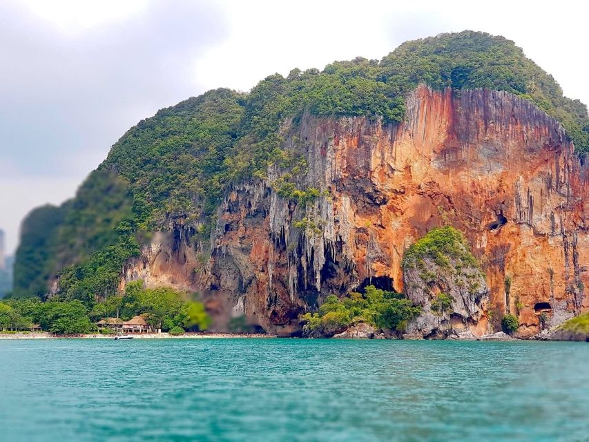 Krabi: 4 Islands Day Trip by Speedboat Including Lunch Box - Phra Nang Beach and cave shrine: where beach beauty meets local belief