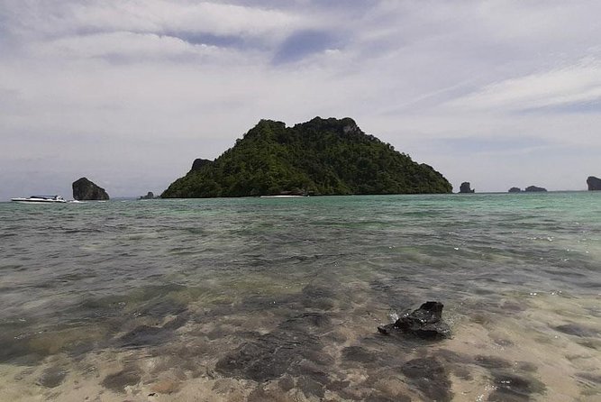 Krabi 7 Islands Snorkeling and Sunset Tour by Speedboat - Railay Beach sunset barbecue and the fire show