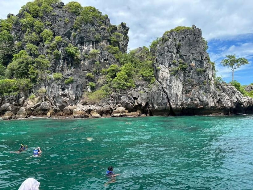 Krabi: 7 Islands Sunset by Longtail Boat with Snorkeling - Snorkeling Stop 1: Yawasom Island for Colorful Reefs