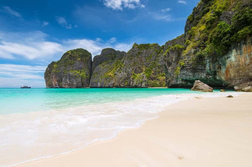 Krabi: One Day Phi Phi Island by speed boat ( Join ) - Cruising Past Viking Cave and Learning the Bird’s Nest Story
