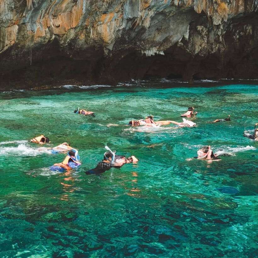 Krabi: Phi Phi Islands Speedboat Tour with Buffet Lunch - Snorkeling stops: coral color, gear included, and real confidence building