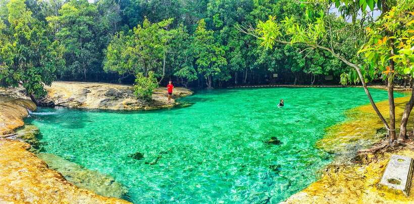 Krabi: Tiger Cave Temple, Emerald Pool and Hot Springs Tour - Stop 3: Krabi hot springs waterfall soak and leg recovery