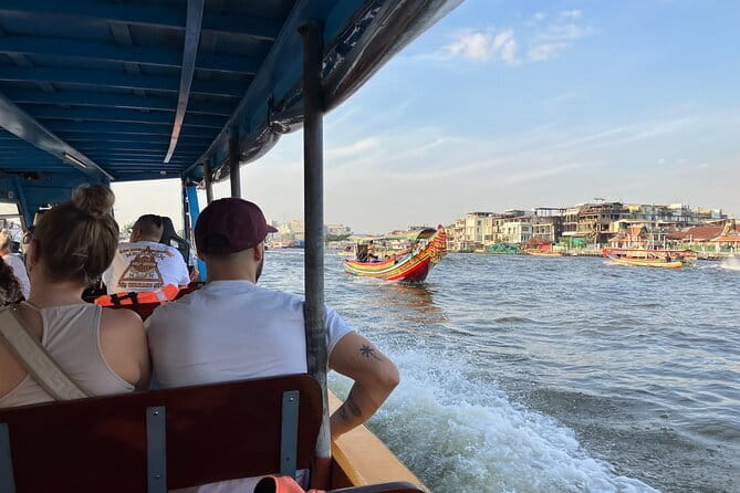 Maeklong Railway and Damnoen Saduak Floating Market Tour - Maeklong Railway Market: The Umbrella-Pulldown Photo Moment