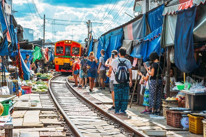 Maeklong Railway & Floating Market Tour (Private & All-Inclusive) - Wat Bang Kung: the banyan roots temple that looks surreal