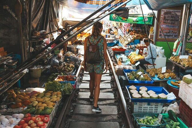 Maeklong Railway Market and Damnoen Saduak Floating Market Tour From Bangkok - Damnoen Saduak Floating Market: Boat Cruising and Canal Food