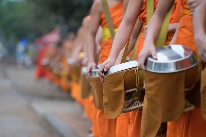 Morning Buddhist Almsgiving, Grand Palace and Flower Market Tour in Bangkok - Wat Phra Kaew and the Grand Palace Complex, Emerald Buddha and Royal Spaces