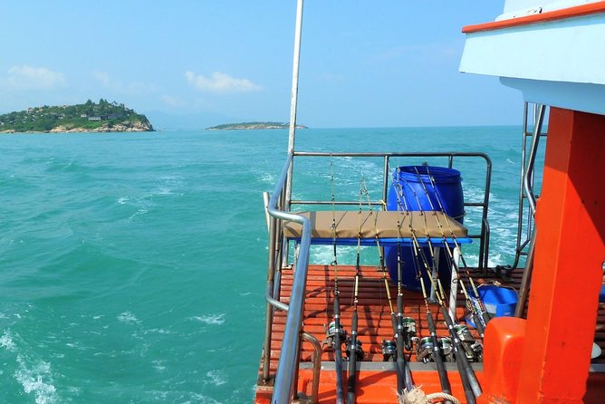 Mr. Tu Fishing Day Trip by Escort Boat from Koh Samui - Towels, life jackets, and heat management on a hot day