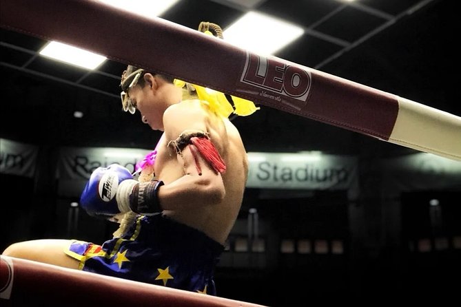 Muay Thai Boxing Show with Ringside Seats at Rajadamnern Stadium - Ringside Atmosphere: Crowd Energy and the Betting Factor