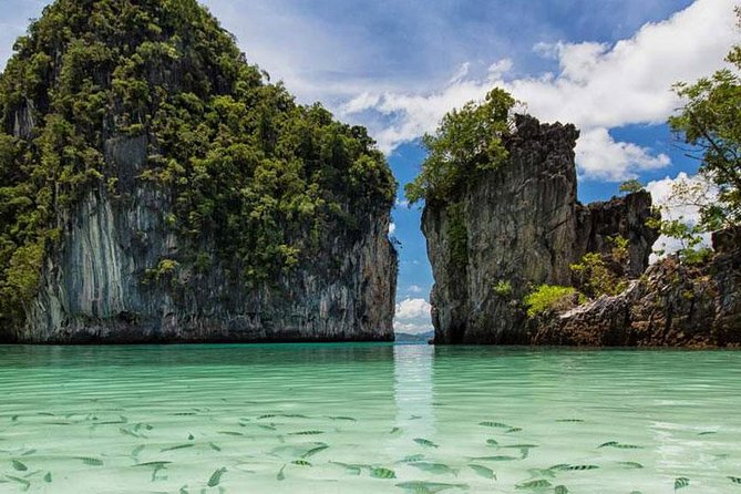 One-Day Tour at Hong Islands by Speedboat from Krabi - Stop 1, Hong Island: Limestone Cliffs, a Sheltered Beach, and the Lagoon Feel