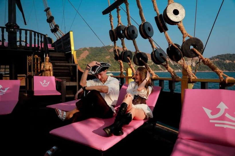 Pattaya: Koh Larn Pirate Cruise with Transfer & Activities - First island play zone: beaches plus banana boat, snorkeling, and more