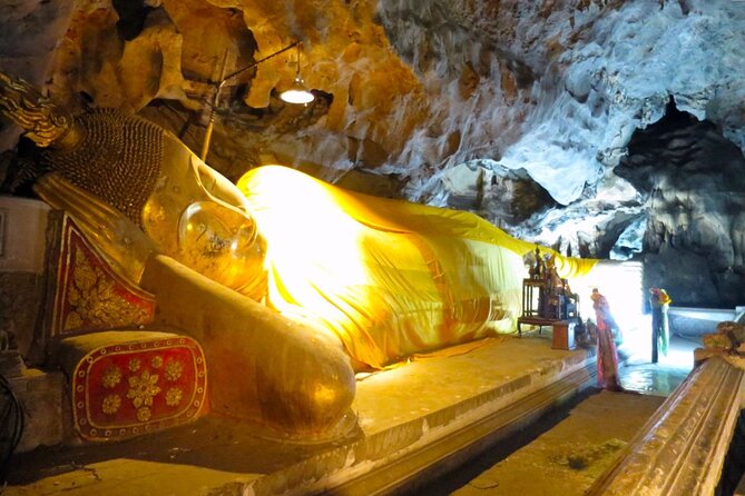 Petchaburi Highlights Khao Luang Cave, Palaces & Temples Group Tour from Hua Hin - Tham Khao Luang Cave Shrine: Stairs, Stalactites, and a King’s Connection