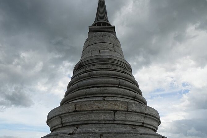 Petchaburi Highlights Khao Luang Cave, Palaces & Temples Group Tour from Hua Hin - Lunch, Bottled Water, and Keeping a Good Pace in Humid Thailand