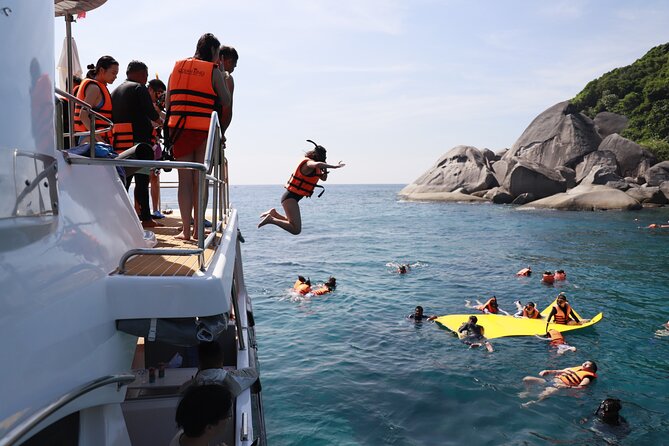 Phi Phi Island & Maiton Island Full Day Tour with Luxury Yacht - Maiton Private Island: slides, paddle boards, and a second snorkeling session