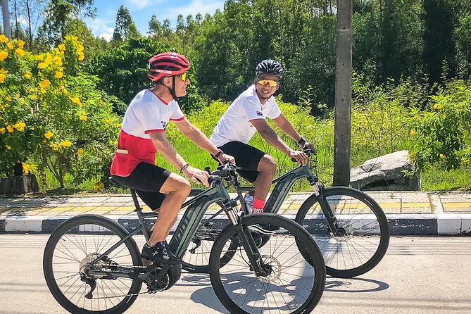Phuket Coast To Coast E-Bike Tour - E-bike ease on rural roads: Bangtao, Laguna Golf, and the working island