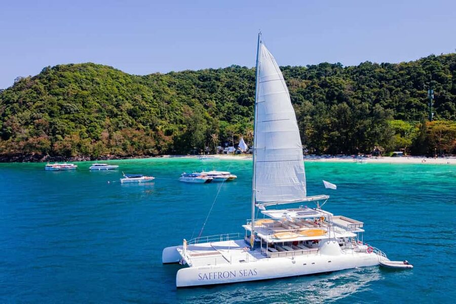 Phuket: Coral Island Snorkeling & Promthep Sunset Dinner - How the Day Moves: From Chalong Pier to a Yacht Seat