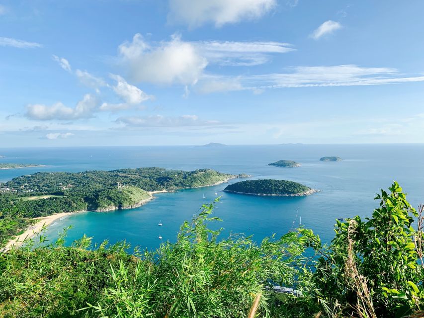 Phuket: Half-Day City Highlights and Viewpoints Group Tour - Promthep Cape near a wind power plant: a different kind of viewpoint stop