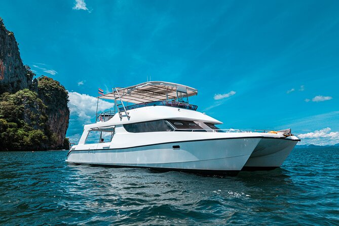 Phuket: James Bond Island & Phang Nga Bay Sunset Luxury Yacht - Naka Island fun: papaya salad making, afternoon tea, slide, and SUP