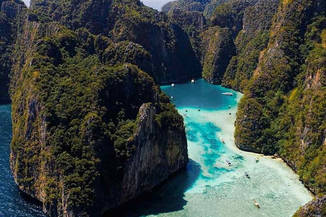 Phuket: Phi Phi Islands, Maya bay & Khai Island Tour by Speedboat - Pileh Bay and the Pileh lagoon stop: swimming and optional longtail photo time