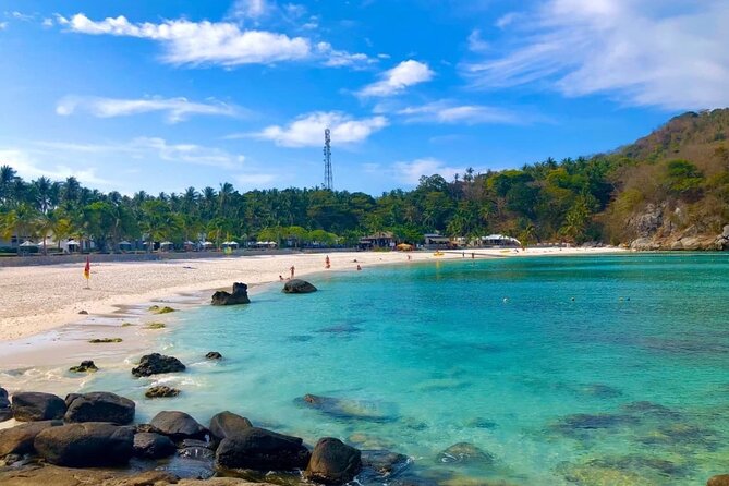 Phuket Raya Island Day Tour with Snorkeling OR Scuba Diving - Coral Island beach time: swimming, sunbathing, and chair rental