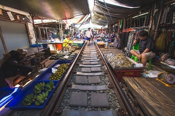 Private Amphawa & Maeklong Railway Market Day Tour with Fireflies - Mae Klong Railway Market (Hoop Rom Market): The Train Moment You Came For