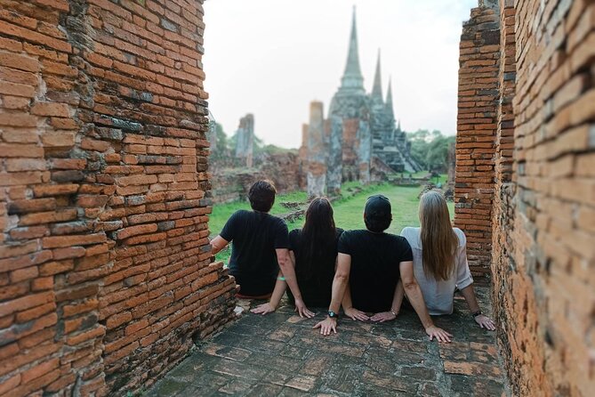 PRIVATE Ayutthaya + SUNSET Boat Tour + Light up The NIGHT - Wat Mahathat: crumbling chedi, laterite walls, and headless Buddha images