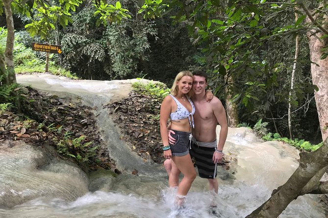 Private Chiang Mai Tour to Bua Thong Waterfalls and Ziplining - Chiang Mai market time: Thai snacks, clothing stalls, and everyday local life