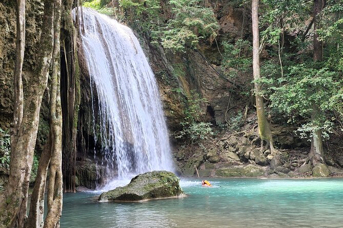 Private Tour: Kanchanaburi Erawan Waterfall Tour from Bangkok - War Cemetery and the River Kwai Bridge, where meaning hits harder