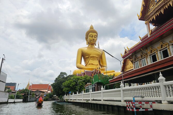 Private tour to Wat Pho,Wat Arun, Canal Tour,Flower Market - Wat Arun: 67 meters of porcelain detail at Temple of Dawn
