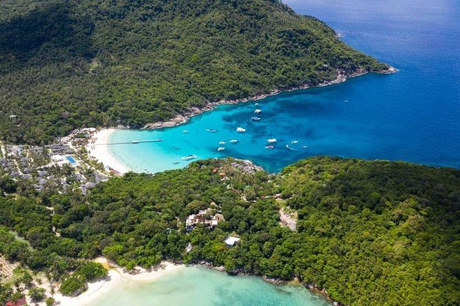 Racha and Coral Island One Day Trip + Sunset by Luxury Catamaran From Phuket - Ko He on Coral Island: beach time, mask and snorkel, and optional sea-sports