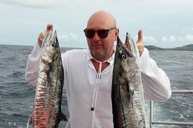 Racha Island Fishing Game From Phuket - Lunch, fruits, and snorkeling time that actually make the day worth it