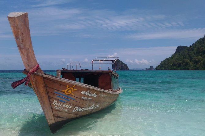 Railay and 4-Island Sunset Speedboat Cruise with Night Snorkel - Koh Poda Island: white sand, clear water, and the daytime swim