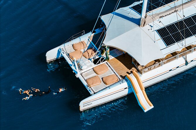 Rhapsody Phuket Coral & Racha Sunset Catamaran Cruise - The sea-view party, DJ energy, and afternoon tea onboard