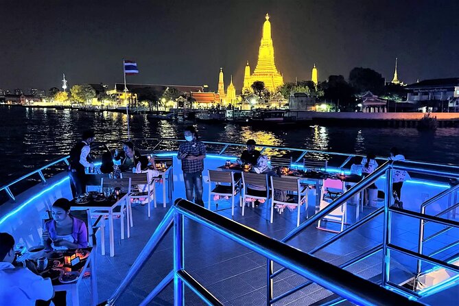 Smile Dinner Cruise Experience: Dining & Live Entertainment - Seating, deck level, and the rain reality on a river pier