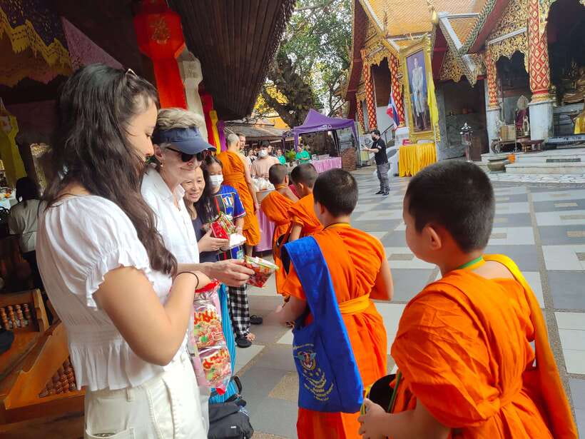 Spiritual Sunrise Wat Doi Suthep, Pha Lat, Alms & Meditation - Wat Phra That Doi Suthep: 306 steps, tram option, and a golden view