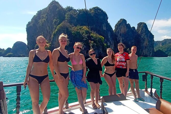 Sunset Dinner Cruise with night Swimming by Luxury Junk Boat - Sunset on deck: the best reason to pick this specific timing