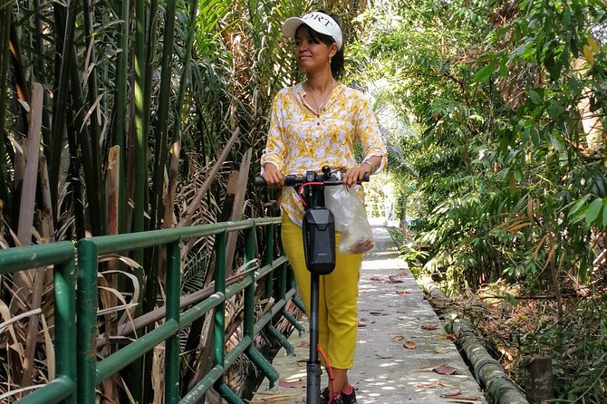 Take a E-Scooter Ride in Bangkok's Jungle - Meeting at Wat Khlong Toei Nok Pier and the ferry hop