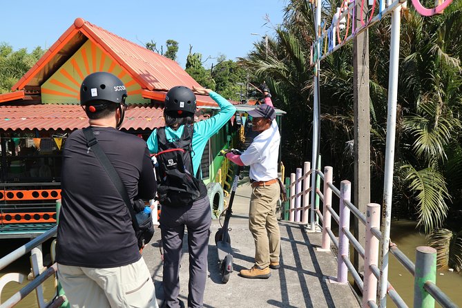 Take a E-Scooter Ride in Bangkok's Jungle - Guides and safety, why small groups matter here